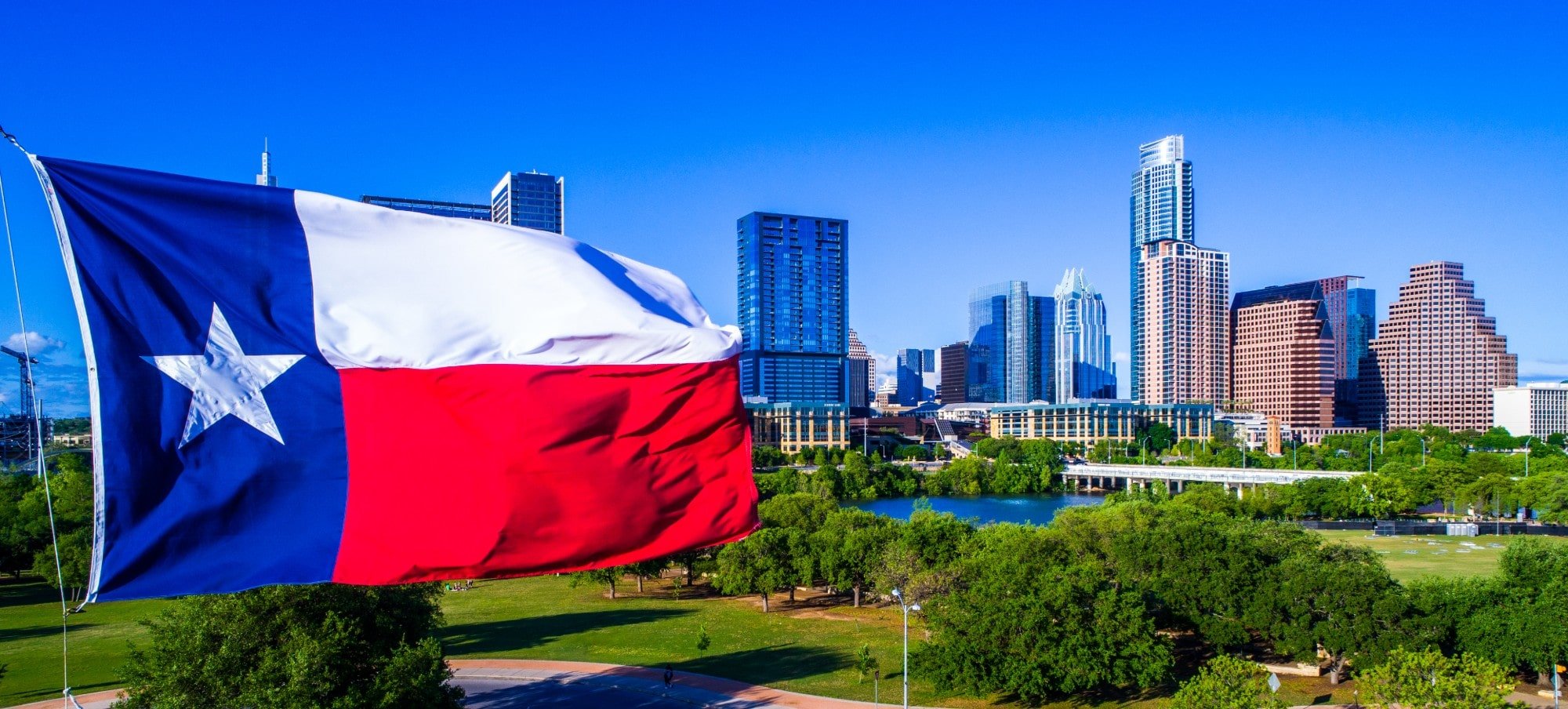 texas flag & downtown Austin, tx
